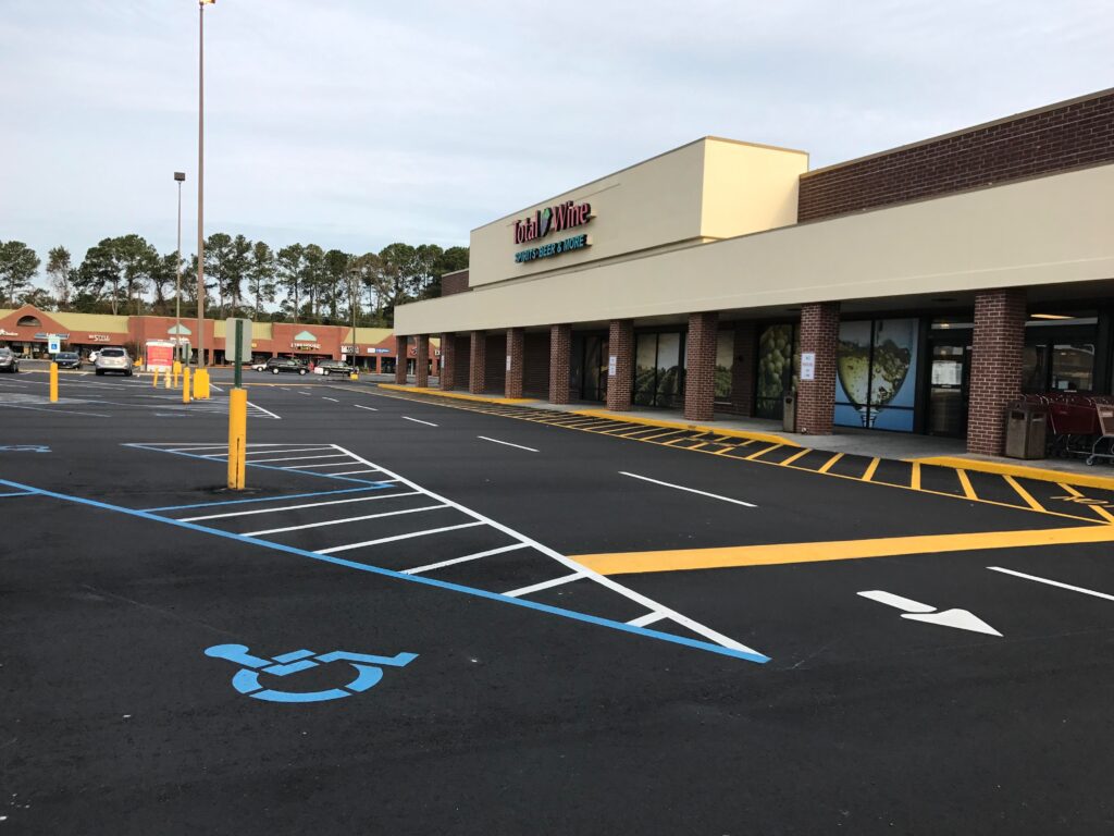 Professional line striping equipment on pavement