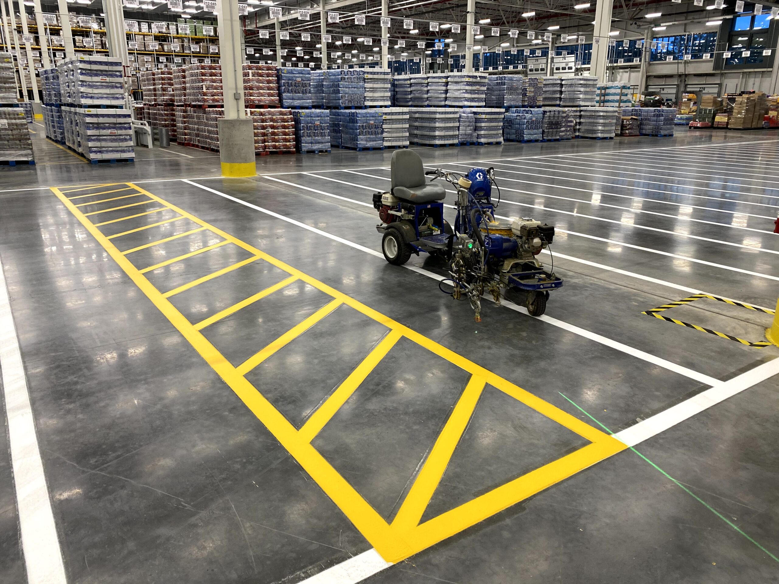 warehouse floor striping pedestrian safety walkways forklift lane markings distribution center in Dallas