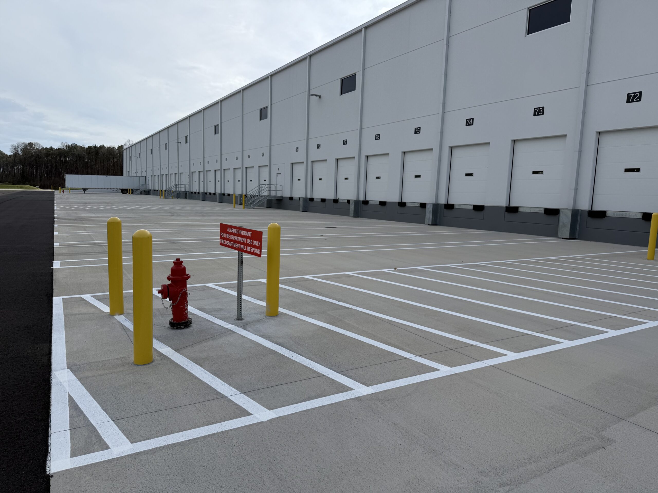 commercial parking lot restriping wisconsin retail center