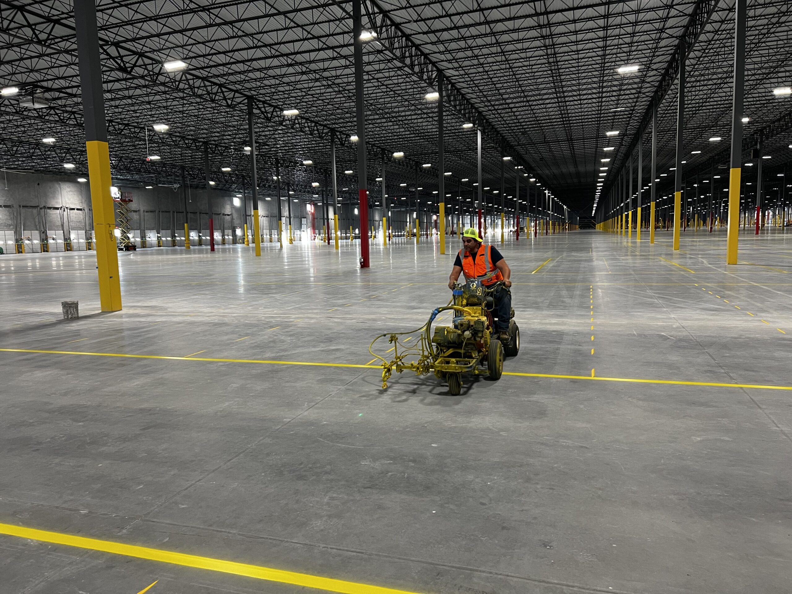 warehouse striping near I-35 corridor distribution center interior