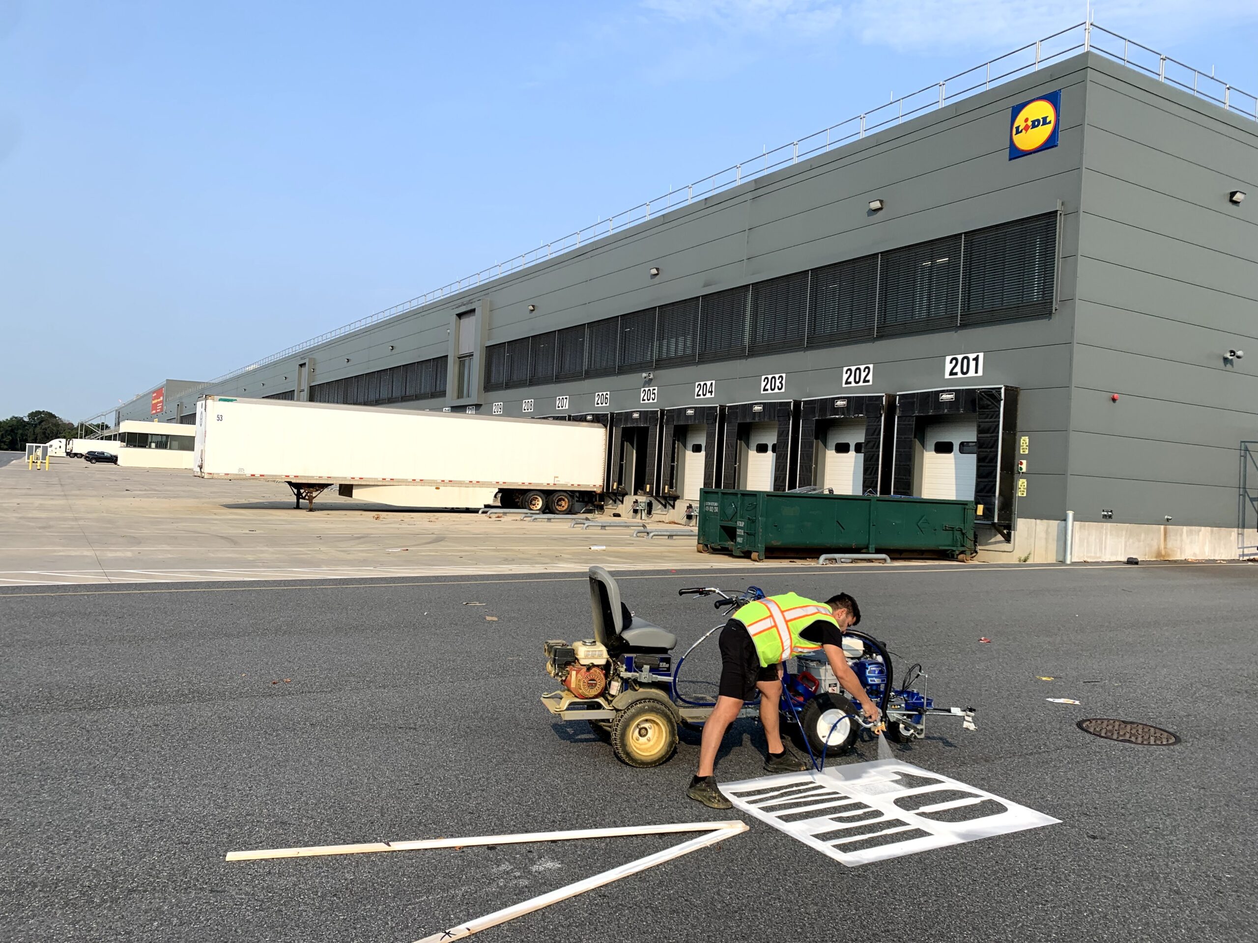 Professional warehouse restriping services near you with clean lines and safety layout