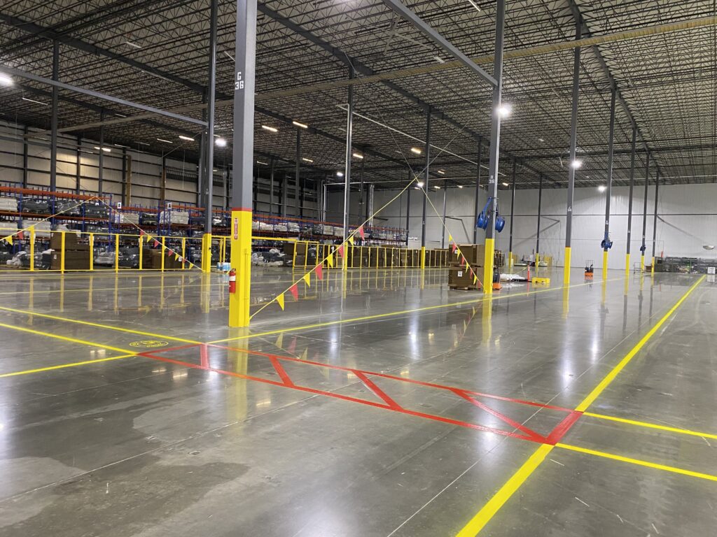 Warehouse floor striping near I81 corridor with OSHA safety walkways and forklift lanes