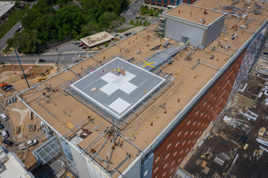 Rooftop helipad work area and surrounding hospital buildings
