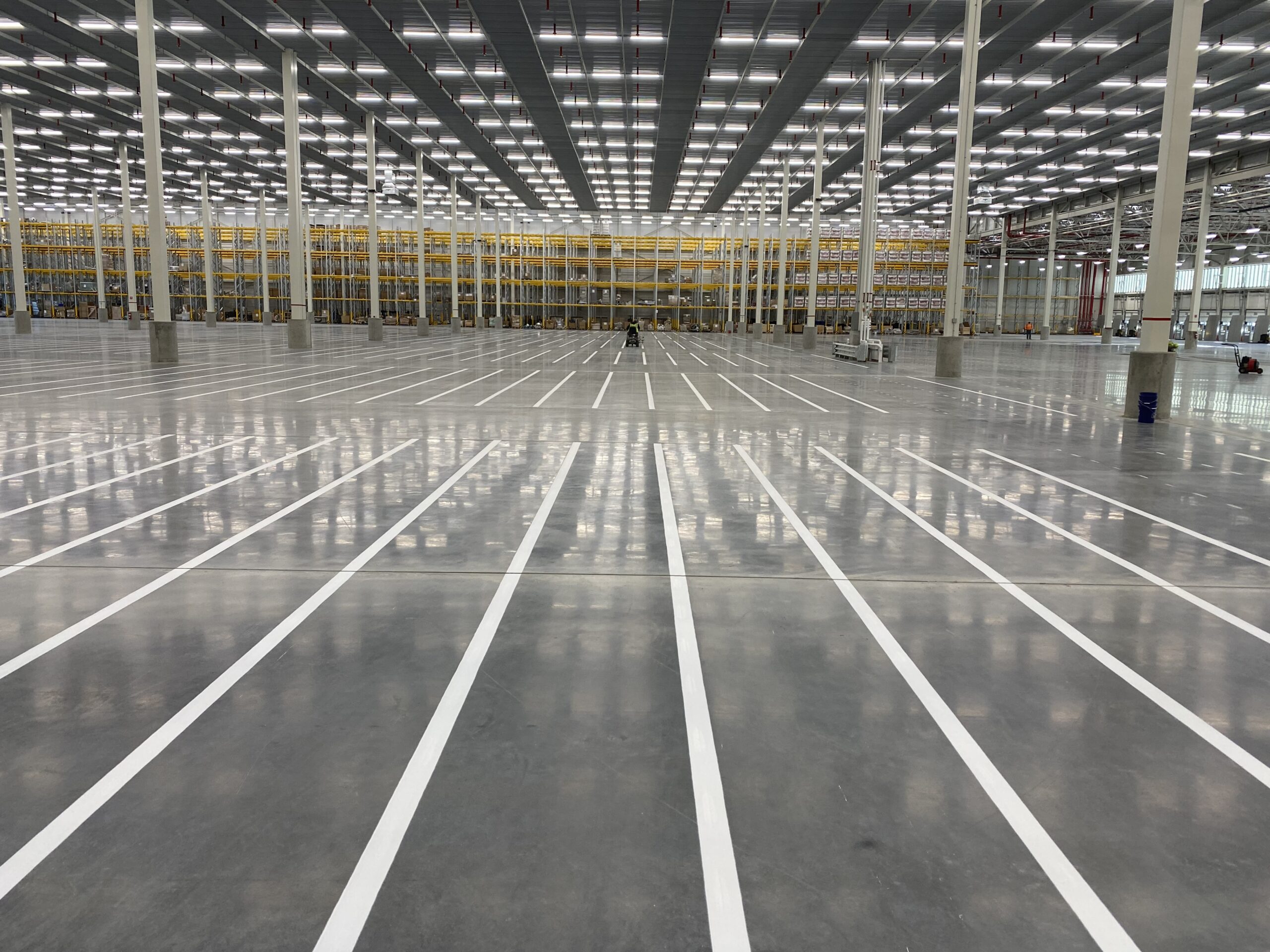 Commercial warehouse line striping throughout Michigan for distribution centers, automotive facilities, and industrial buildings