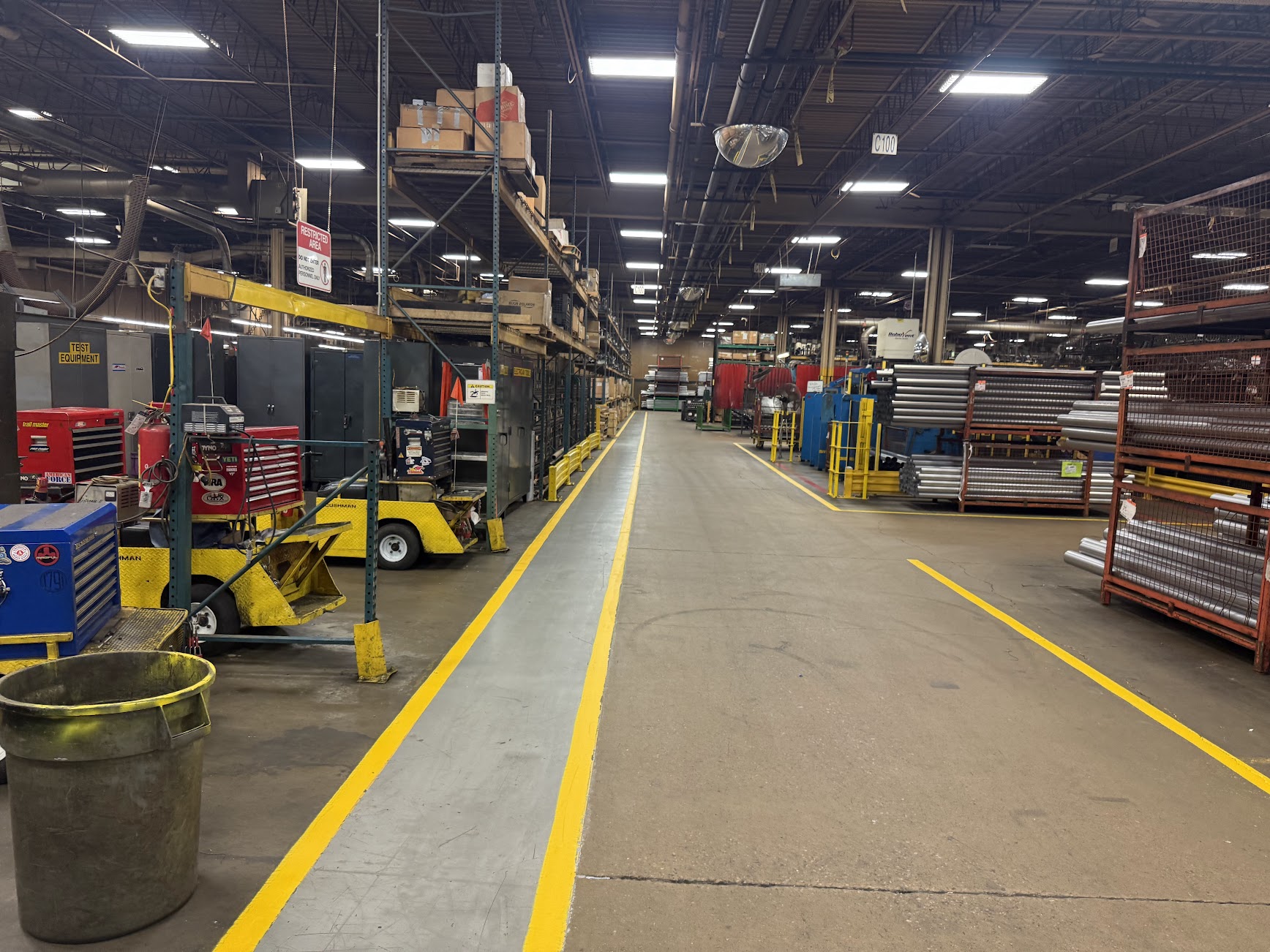 Industrial warehouse aisle with storage racks and equipment