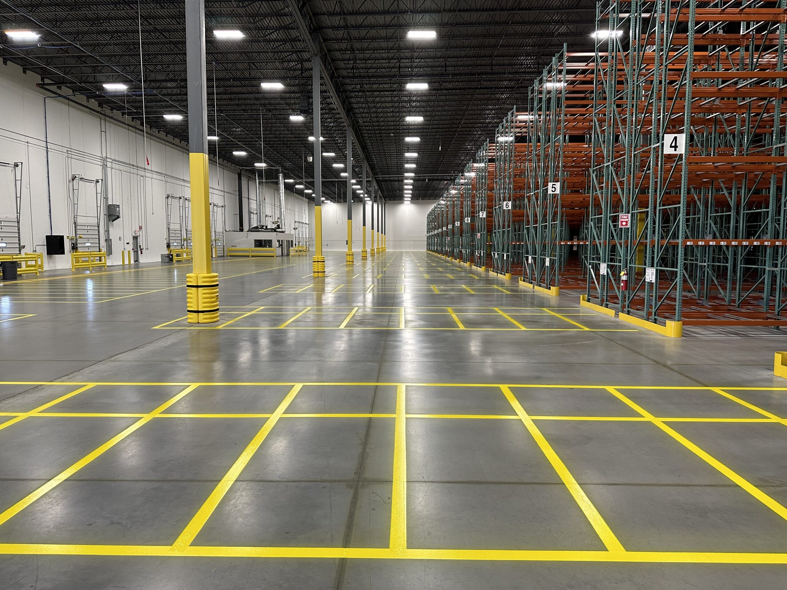 Universal Striping warehouse floor marking project photo, illustrating services available for Rochester NY facilities