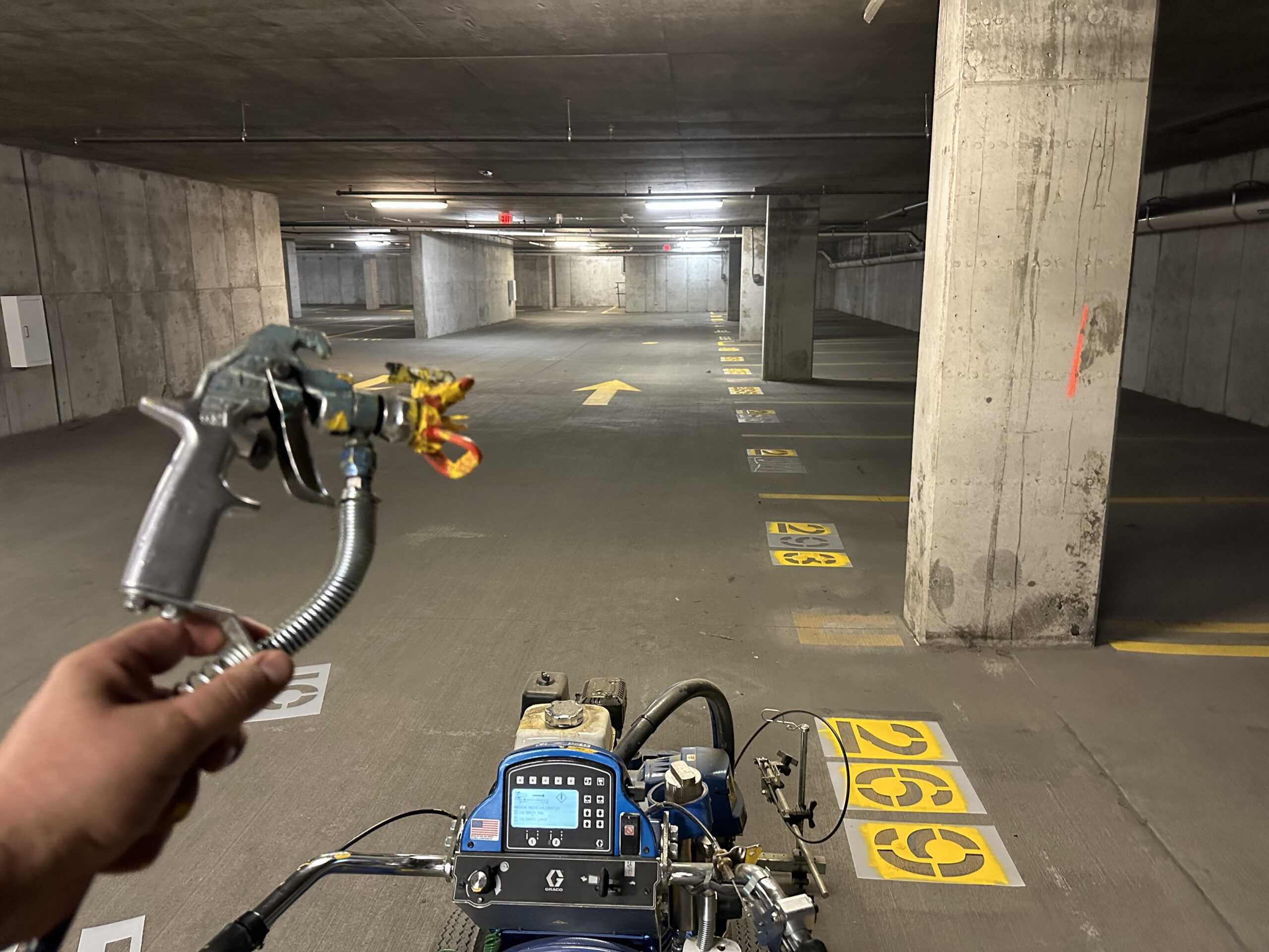 Chicago parking garage striping with directional markings and traffic lanes