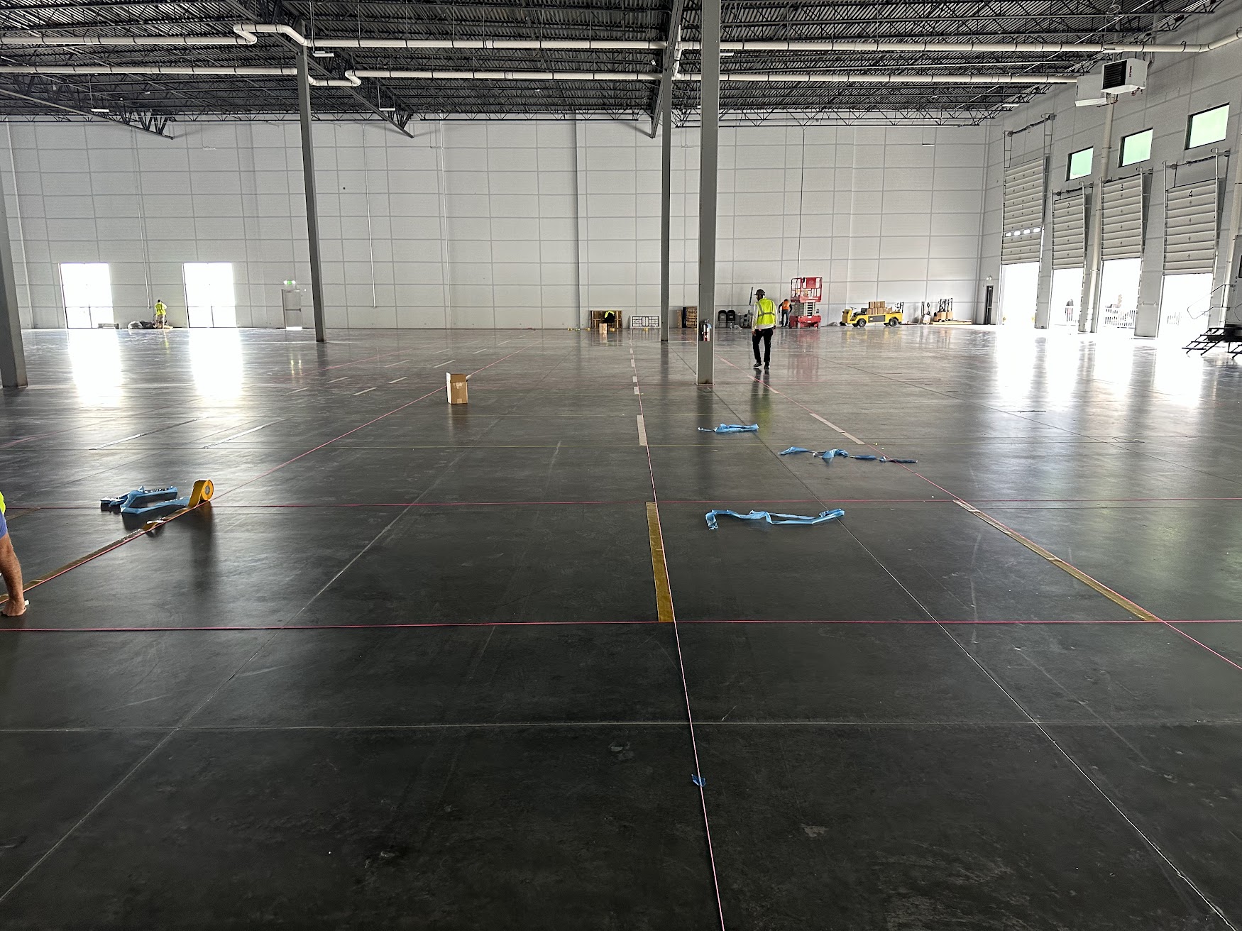 Large warehouse prepared for industrial floor tape installation