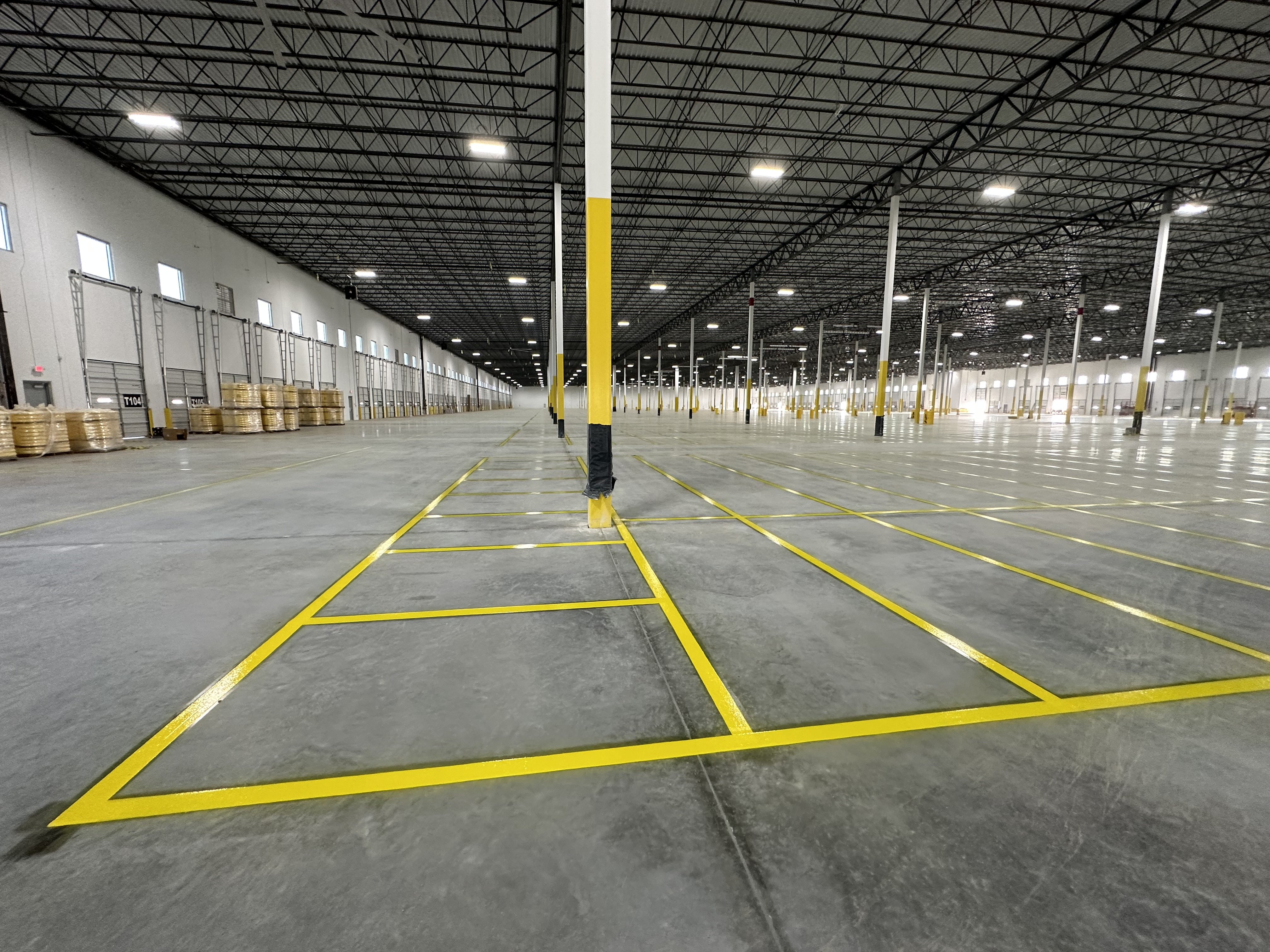 Industrial warehouse floor striping project photo 1