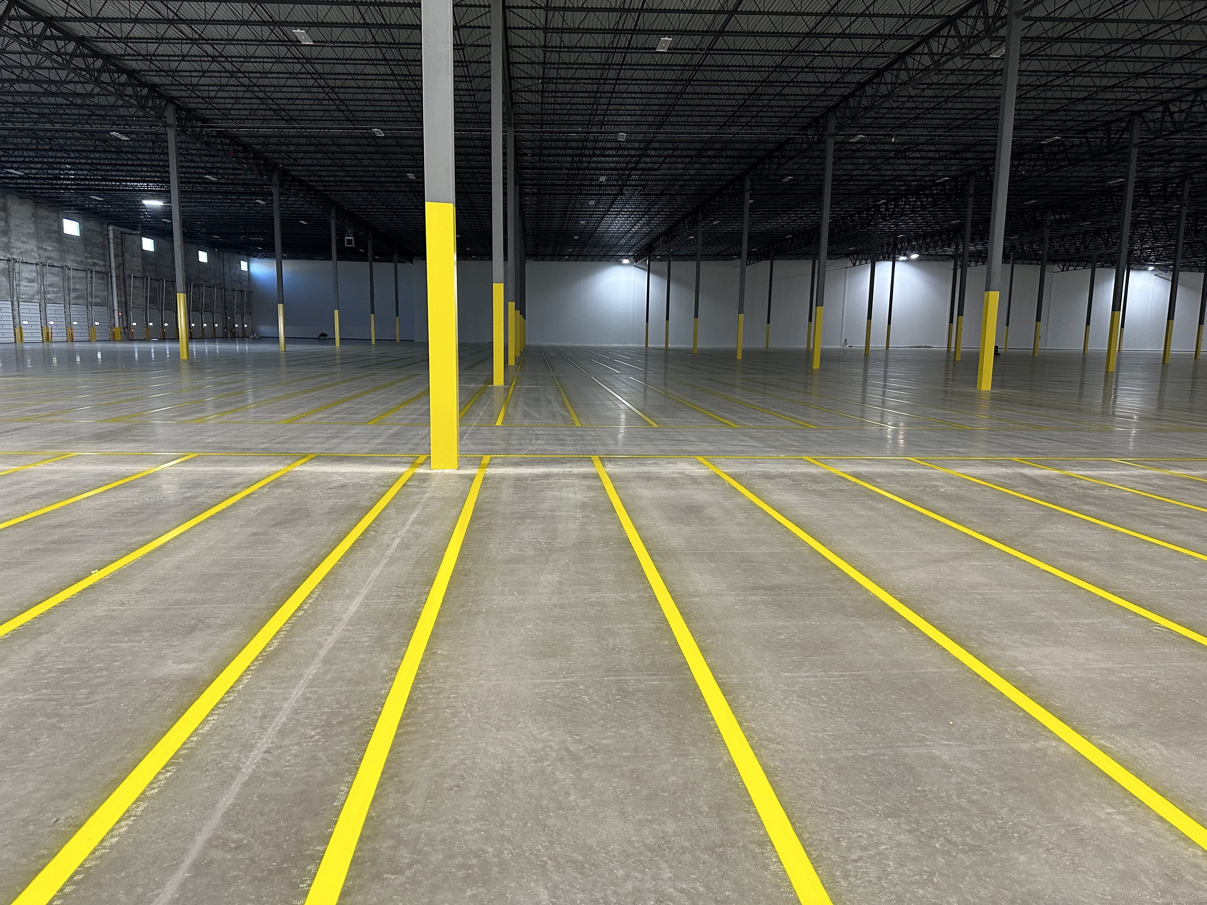 Industrial warehouse floor striping project photo 1