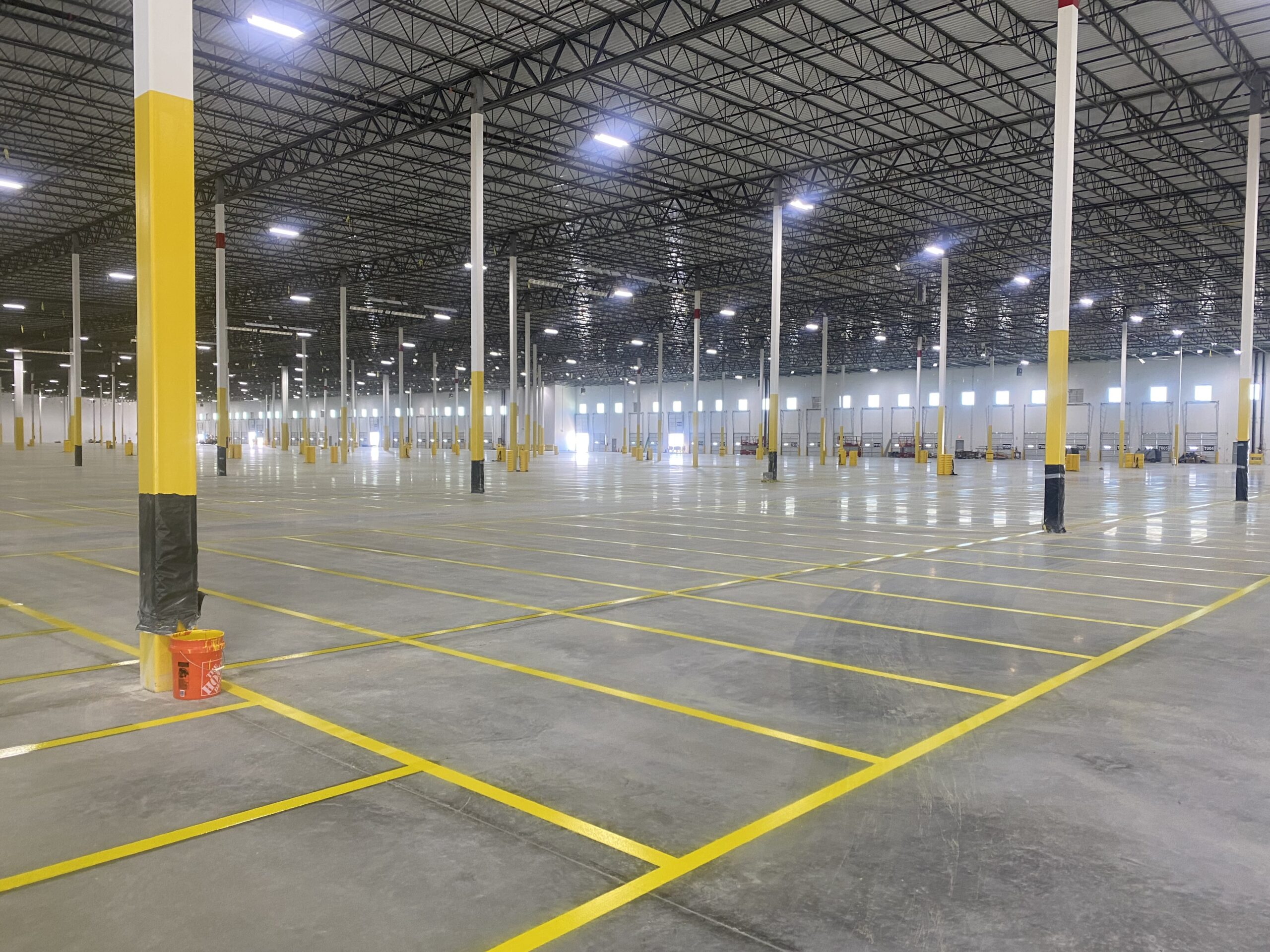 Industrial warehouse floor striping and safety markings